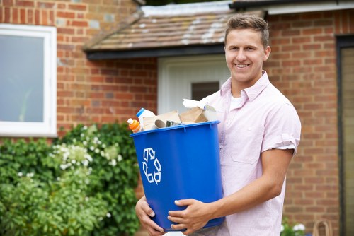 Professional team clearing garage clutter